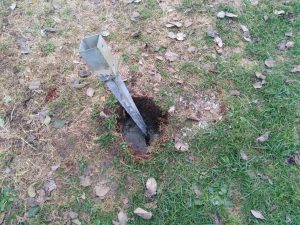 Casita de madera con columpio